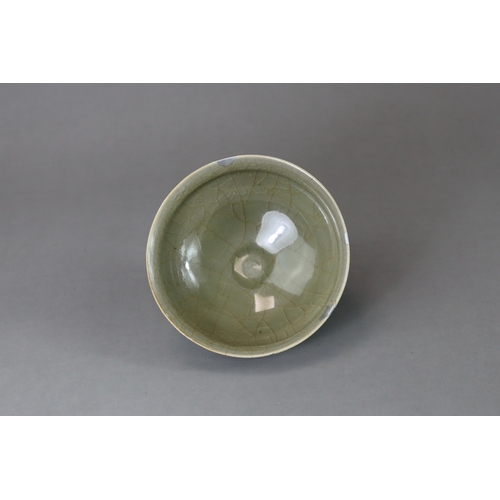 41 - A Longquan Celadon Cup, Song dynasty potted with rounded sides rising from a narrow foot to a softly... 