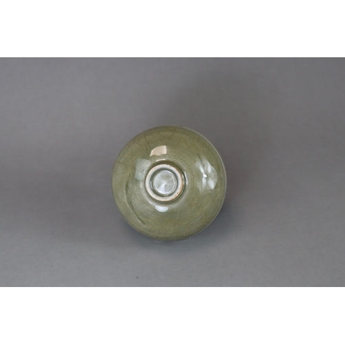 41 - A Longquan Celadon Cup, Song dynasty potted with rounded sides rising from a narrow foot to a softly... 