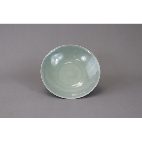 43 - A Longquan Celadon Lotus Dish, Song dynasty with a glossy translucent crackled glaze applied overall... 