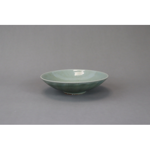 43 - A Longquan Celadon Lotus Dish, Song dynasty with a glossy translucent crackled glaze applied overall... 