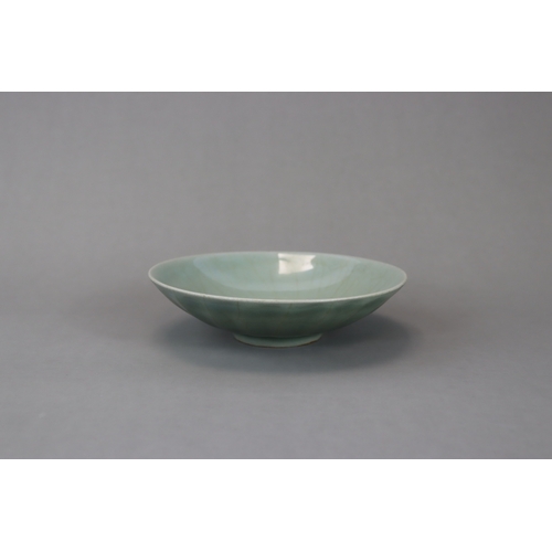 43 - A Longquan Celadon Lotus Dish, Song dynasty with a glossy translucent crackled glaze applied overall... 