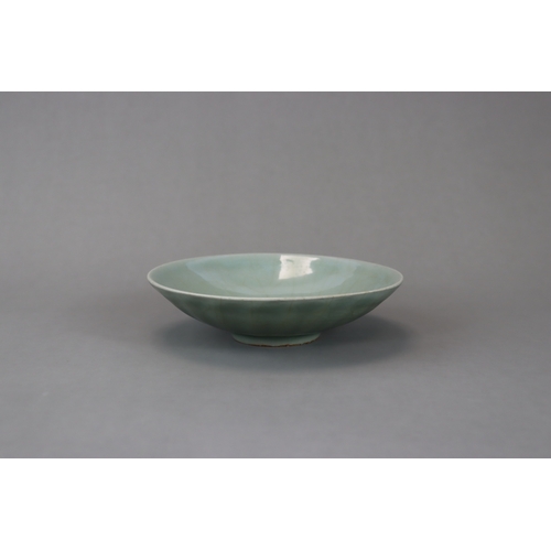 43 - A Longquan Celadon Lotus Dish, Song dynasty with a glossy translucent crackled glaze applied overall... 