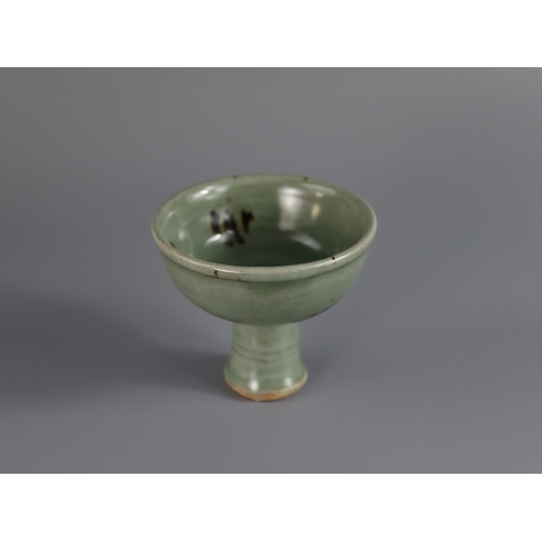 46 - A Longquan Celadon 'Tobi Seiji' Moulded Stemcup, Yuan dynasty  the waisted stem encircled by two rai... 