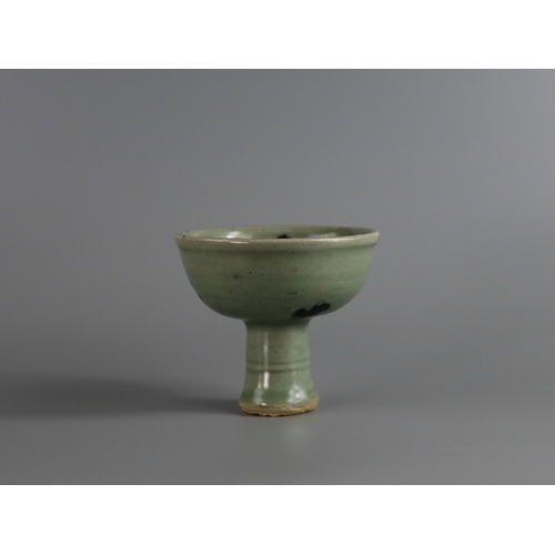 46 - A Longquan Celadon 'Tobi Seiji' Moulded Stemcup, Yuan dynasty  the waisted stem encircled by two rai... 