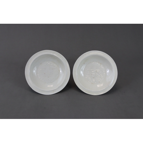 49 - A Pair of Huozhou White-glazed Moulded Dishes, Jin dynasty with rounded sides from straight foot to ... 