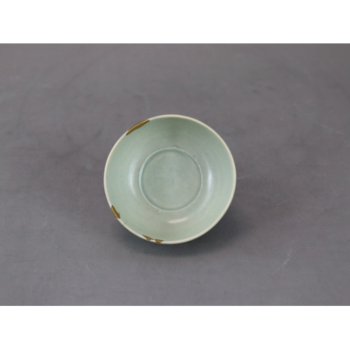 58 - A Rare Yaozhou Celadon Carved Stemcup, Five dynastic rising from a high spreading foot to deep round... 