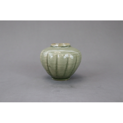 59 - A Rare Yaozhou Celadon Melon-shaped Jar, Song dynasty the lobed globular body thinly potted, rising ... 