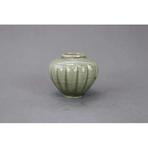 59 - A Rare Yaozhou Celadon Melon-shaped Jar, Song dynasty the lobed globular body thinly potted, rising ... 