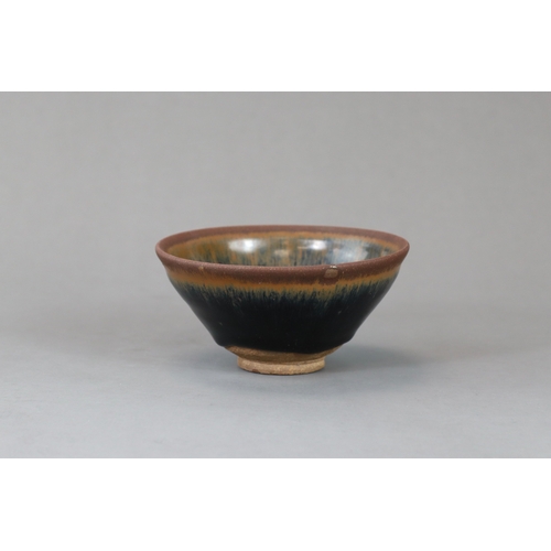 63 - A Jian ware 'Hare's fur' Bowl, Song dynasty of conical shape, the black glaze bowl with fine russet ... 