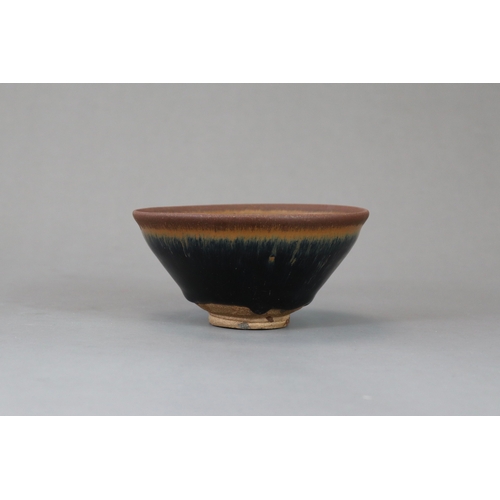 63 - A Jian ware 'Hare's fur' Bowl, Song dynasty of conical shape, the black glaze bowl with fine russet ... 