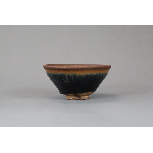 63 - A Jian ware 'Hare's fur' Bowl, Song dynasty of conical shape, the black glaze bowl with fine russet ... 