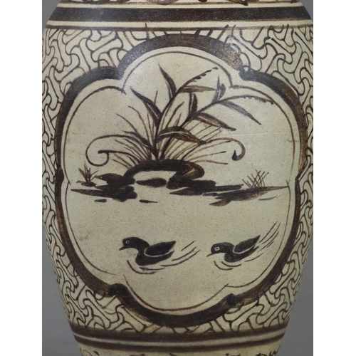 64 - A Jizhou Painted Vase, Song dynasty of baluster form, painted in brown on a white slip with two duck... 