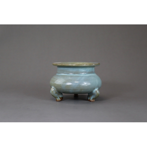 66 - A Rare Jun Blue-glazed Tripod Censer, Song dynasty the compressed globular body supported on three s... 