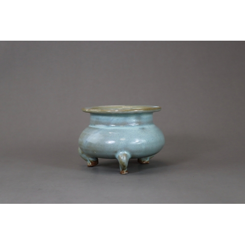 66 - A Rare Jun Blue-glazed Tripod Censer, Song dynasty the compressed globular body supported on three s... 