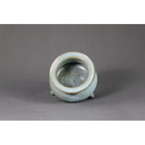 66 - A Rare Jun Blue-glazed Tripod Censer, Song dynasty the compressed globular body supported on three s... 