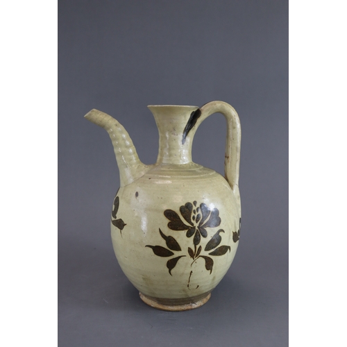 69 - A Cizhou Painted Floral Ewer, Song dynasty rounded body from short straight foot continued with wais... 