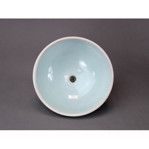 70 - A Celadon Stembowl and Cover carved with Lotus, six character mark of Qianlong the rounded exterior ... 