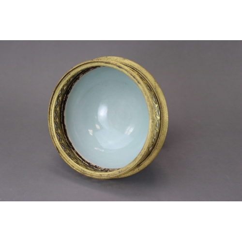 70 - A Celadon Stembowl and Cover carved with Lotus, six character mark of Qianlong the rounded exterior ... 