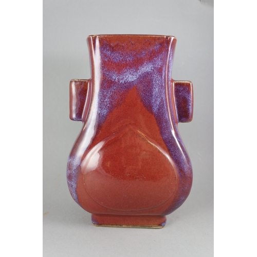 71 - A Flambe Arrow Vase, 18/19th century,  of pear shape and rectangular section, strikingly glazed with... 