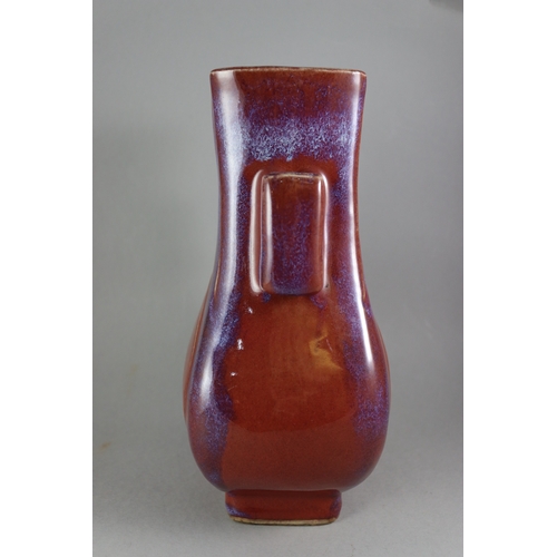 71 - A Flambe Arrow Vase, 18/19th century,  of pear shape and rectangular section, strikingly glazed with... 