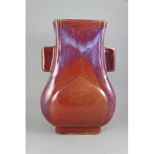 71 - A Flambe Arrow Vase, 18/19th century,  of pear shape and rectangular section, strikingly glazed with... 