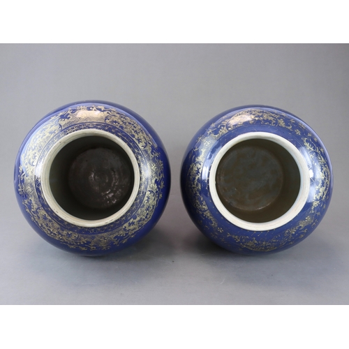 76 - A Pair of Blue and Gilt Jars and Covers, Kangxi the deep blue field richly painted in gilding with s... 