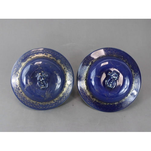 76 - A Pair of Blue and Gilt Jars and Covers, Kangxi the deep blue field richly painted in gilding with s... 