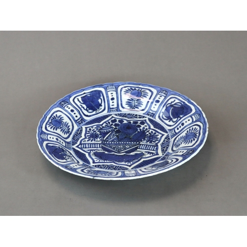 81 - A 'Kraak Porselein' Dish, Wanli,  well painted in intense cobalt with a central star shaped medallio... 