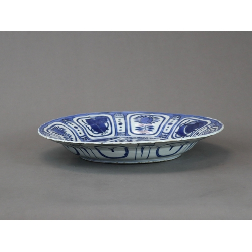 81 - A 'Kraak Porselein' Dish, Wanli,  well painted in intense cobalt with a central star shaped medallio... 