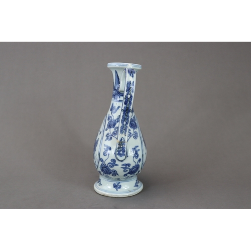 82 - A Blue and White Ewer, late Ming dynasty, of elegant Islamic metal form, the pear shaped vase with l... 