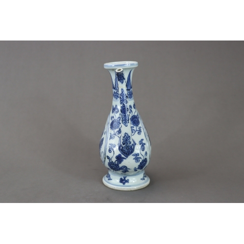 82 - A Blue and White Ewer, late Ming dynasty, of elegant Islamic metal form, the pear shaped vase with l... 