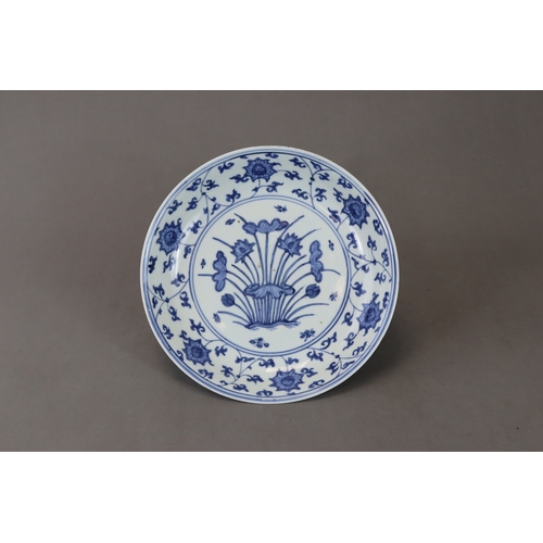 83 - A Blue and White Dish with Lotus, six character mark of Jiajing and of the period, well painted in s... 