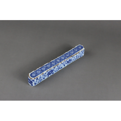 84 - A Rare Blue and White Scrollweight, mid Ming dynasty,  of slender rectangular form with rounded ends... 