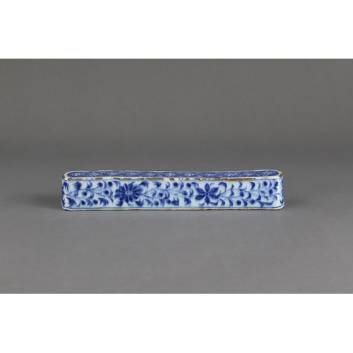 84 - A Rare Blue and White Scrollweight, mid Ming dynasty,  of slender rectangular form with rounded ends... 