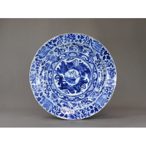 87 - A Large Blue and White 'Moon Rabbit' Dish, Kangxi, with central rabbit medallion within a ring of da... 