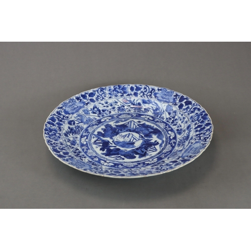 87 - A Large Blue and White 'Moon Rabbit' Dish, Kangxi, with central rabbit medallion within a ring of da... 