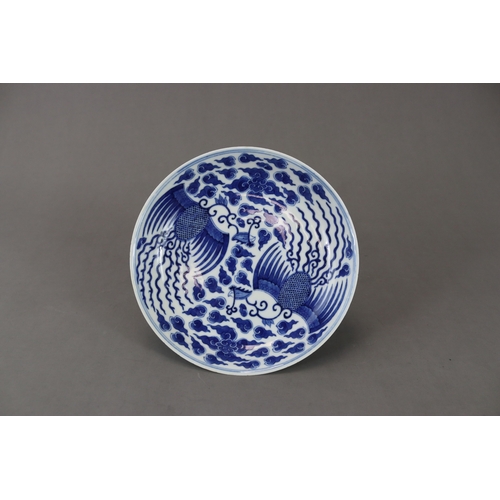 99 - A Blue and White Phoenix Dish, Guangxu mark and of the period painted in soft deep tones on the inte... 