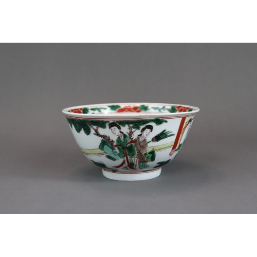 102 - A Wucai Bowl with Ladies, early Kangxi, the rounded sides finely enamelled on the exterior with a co... 