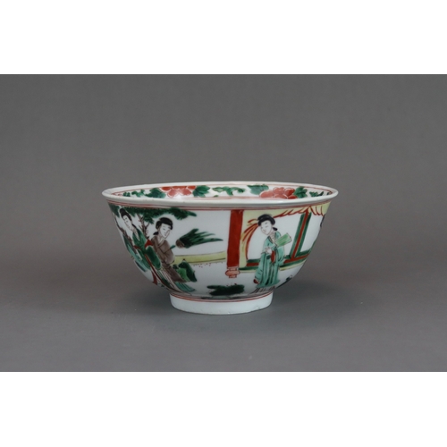 102 - A Wucai Bowl with Ladies, early Kangxi, the rounded sides finely enamelled on the exterior with a co... 