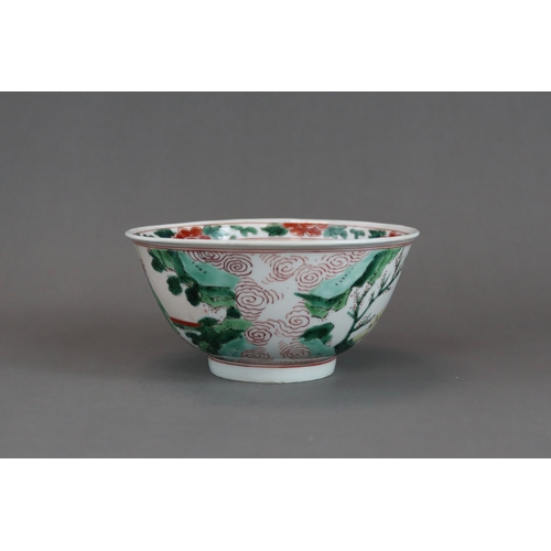 102 - A Wucai Bowl with Ladies, early Kangxi, the rounded sides finely enamelled on the exterior with a co... 