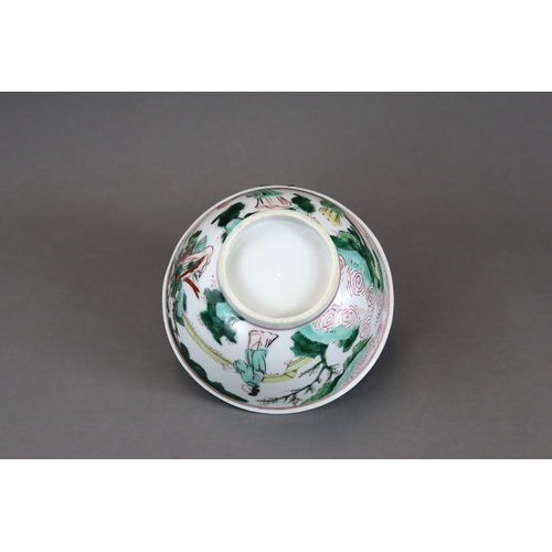 102 - A Wucai Bowl with Ladies, early Kangxi, the rounded sides finely enamelled on the exterior with a co... 