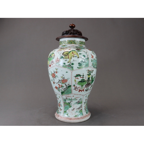 103 - A 'famille verte' Baluster Vase, Kangxi,  the sides attractively decorated with three bands of lotus... 