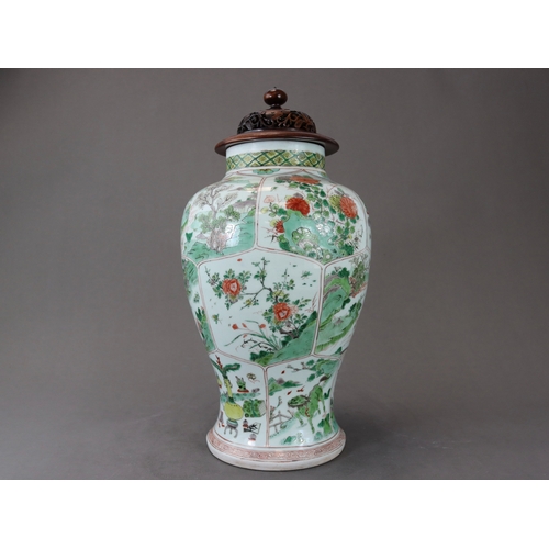 103 - A 'famille verte' Baluster Vase, Kangxi,  the sides attractively decorated with three bands of lotus... 