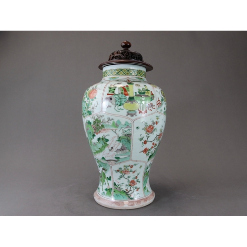 103 - A 'famille verte' Baluster Vase, Kangxi,  the sides attractively decorated with three bands of lotus... 