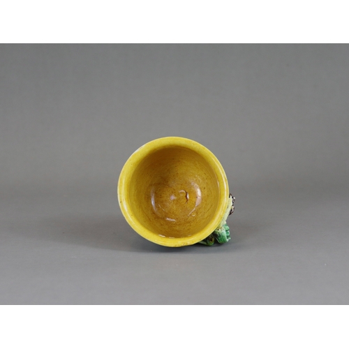 105 - An 'Egg and Spinach' Winecup, Kangxi, of deep rounded form with moulded chilong loop handle, covered... 