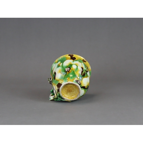 105 - An 'Egg and Spinach' Winecup, Kangxi, of deep rounded form with moulded chilong loop handle, covered... 