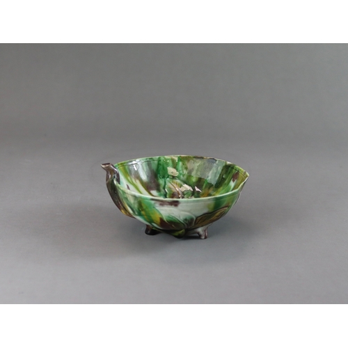 106 - A Peach Shaped 'Egg and Spinach' Winecup, Kangxi, the elegant vessel thinly potted as a fruiting pea... 