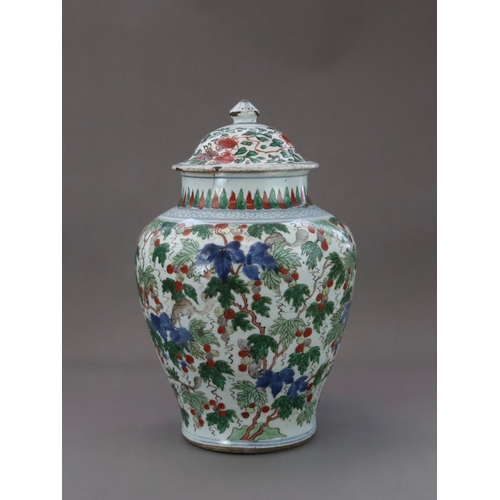 107 - A 'famille verte' Squirrel and Grapevine Jar, and a cover, early Kangxi the baluster sides well pain... 