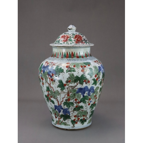 107 - A 'famille verte' Squirrel and Grapevine Jar, and a cover, early Kangxi the baluster sides well pain... 