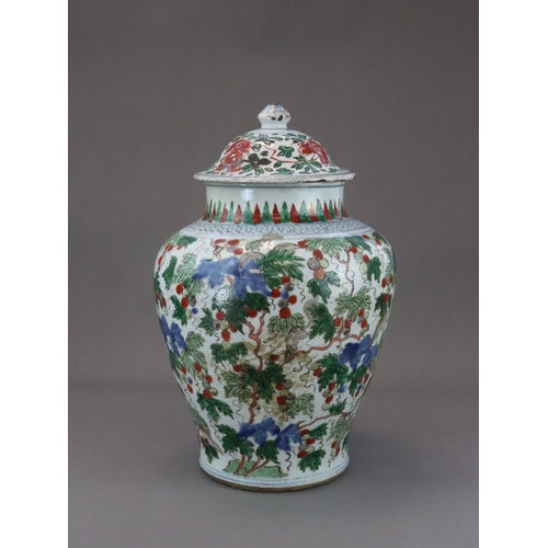 107 - A 'famille verte' Squirrel and Grapevine Jar, and a cover, early Kangxi the baluster sides well pain... 